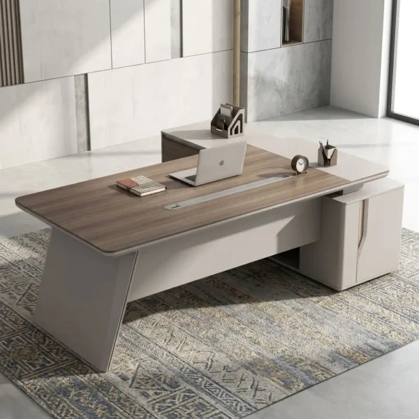 2.4m Commercial Manager Desk in grey walnut woodgrain with side return credenza and cable trough set on a geometric rug.